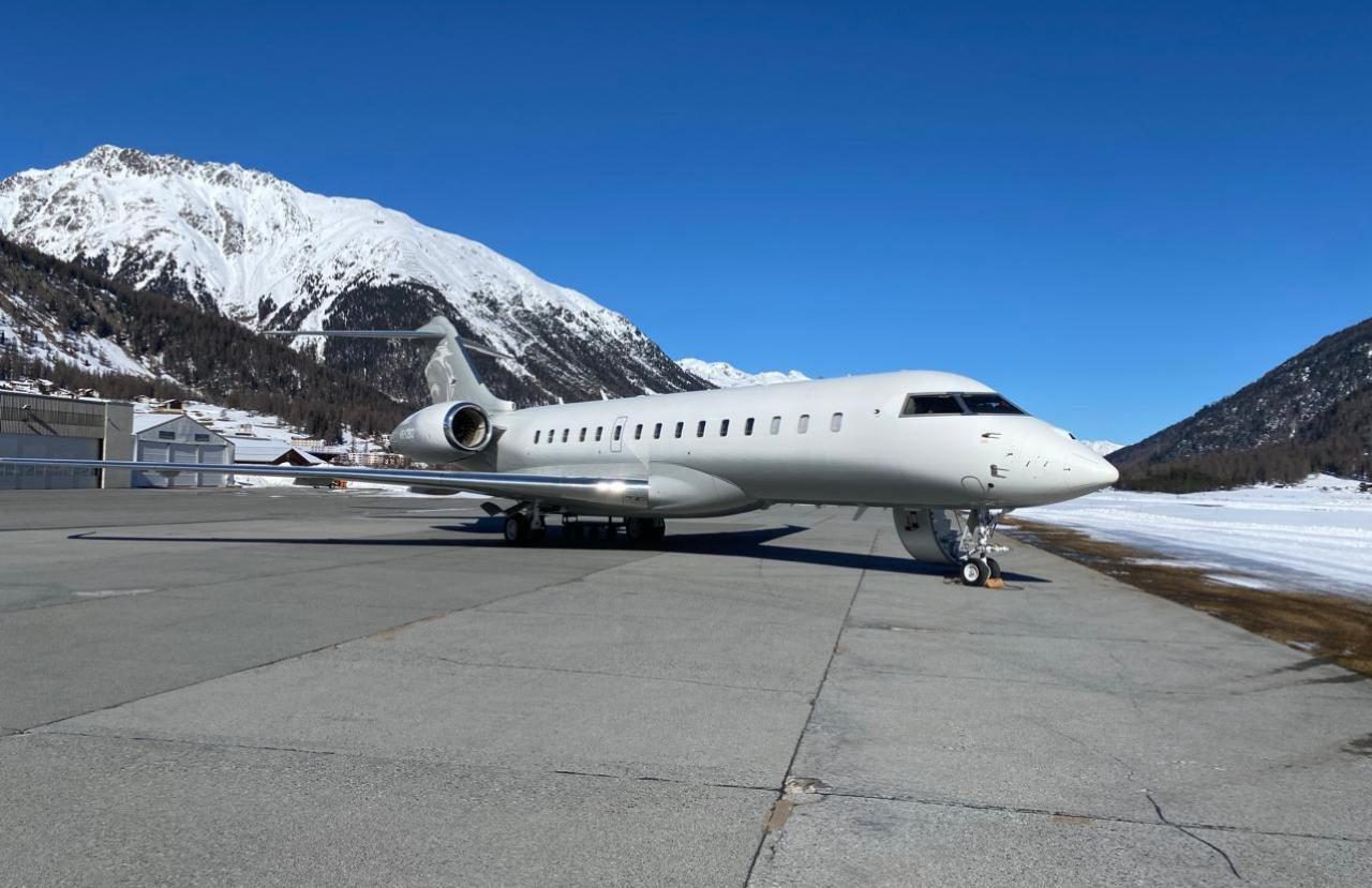 Private jet in the mountains